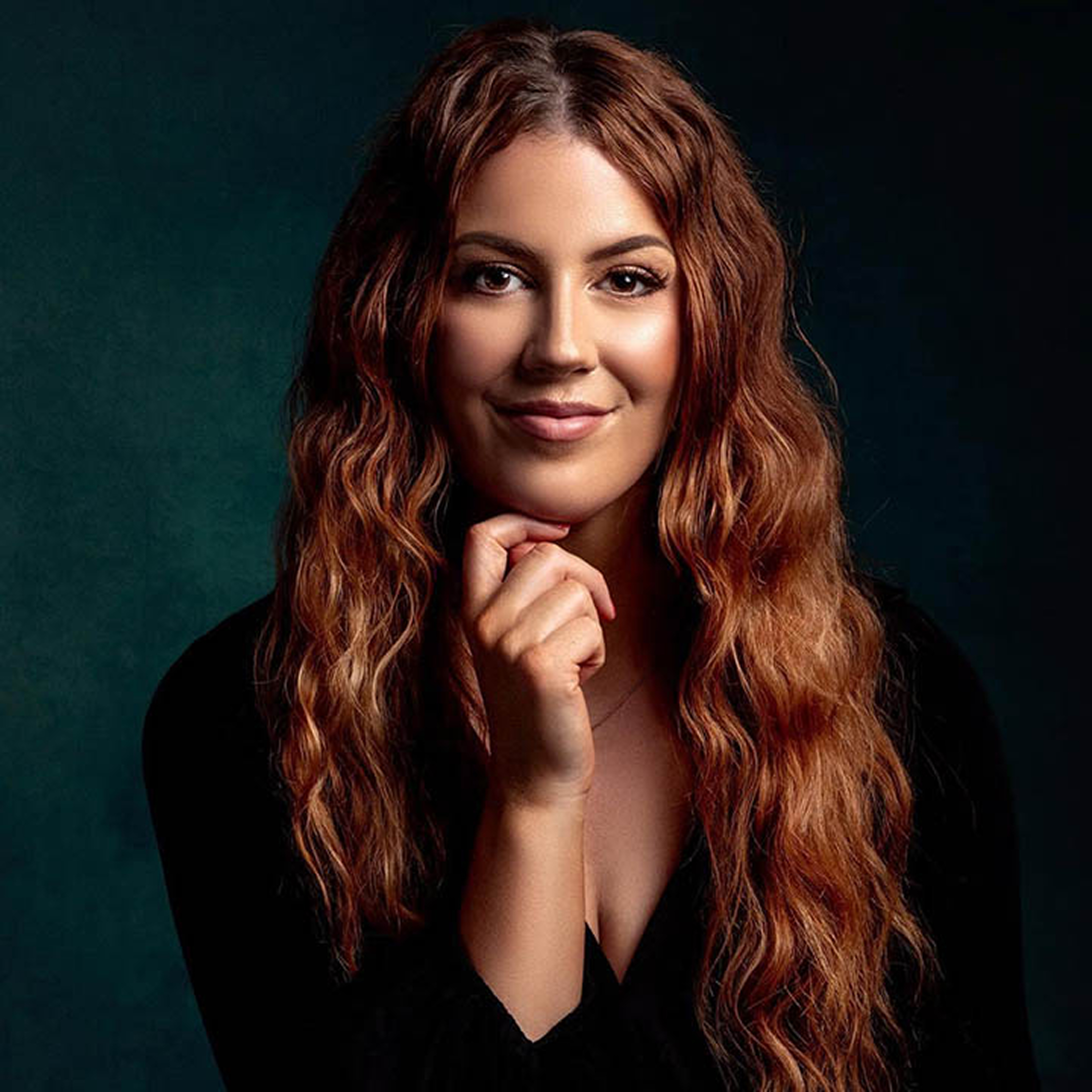 Portrait of Alicia Slater, experienced hairdresser and blonde hair specialist at Alicia Slater Hair Studio in Landsdale, Perth