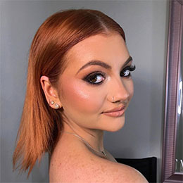 Sleek copper-red hair colour with a straight finish at Alicia Slater Hair Studio in Landsdale, Perth
